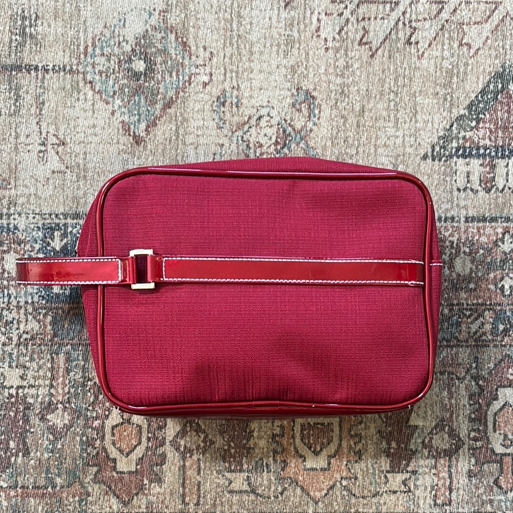 Esteē Lauder Luxurious Red Toiletry Bag with Gold Zipper